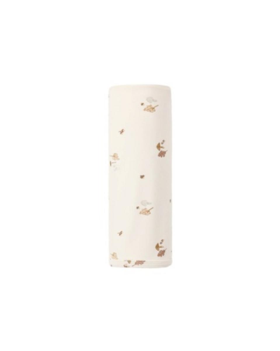 Quincy Mae cream swaddle blanket with small brown and grey leaf and mushroom print