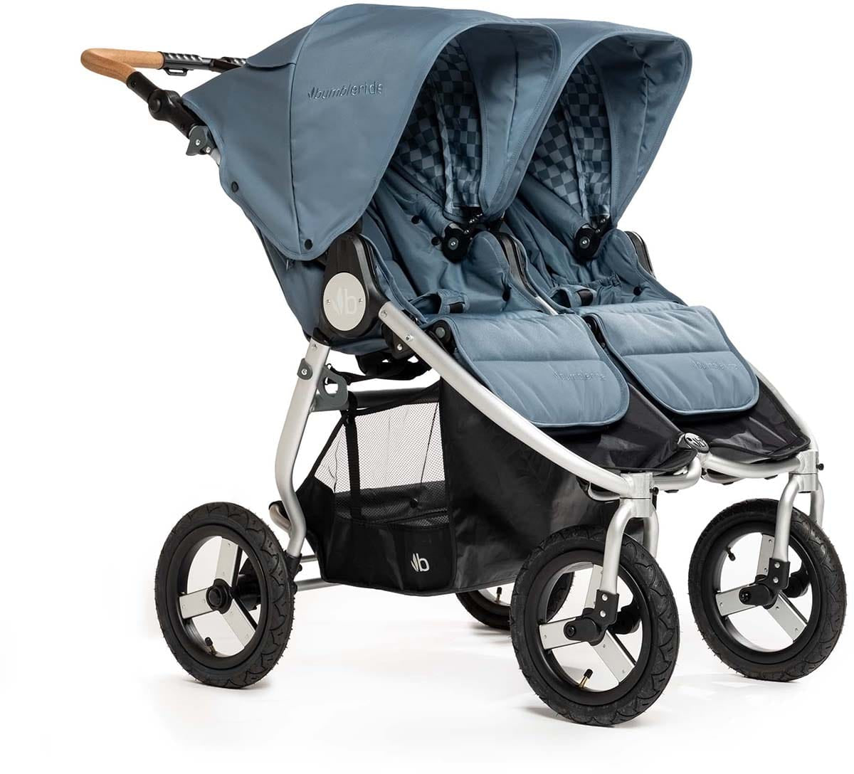 Ocean blue side-by-side double stroller by Bumbleride with silver frame, checkered canopy lining, wooden handle grip, and black mesh storage basket, front three-quarter view