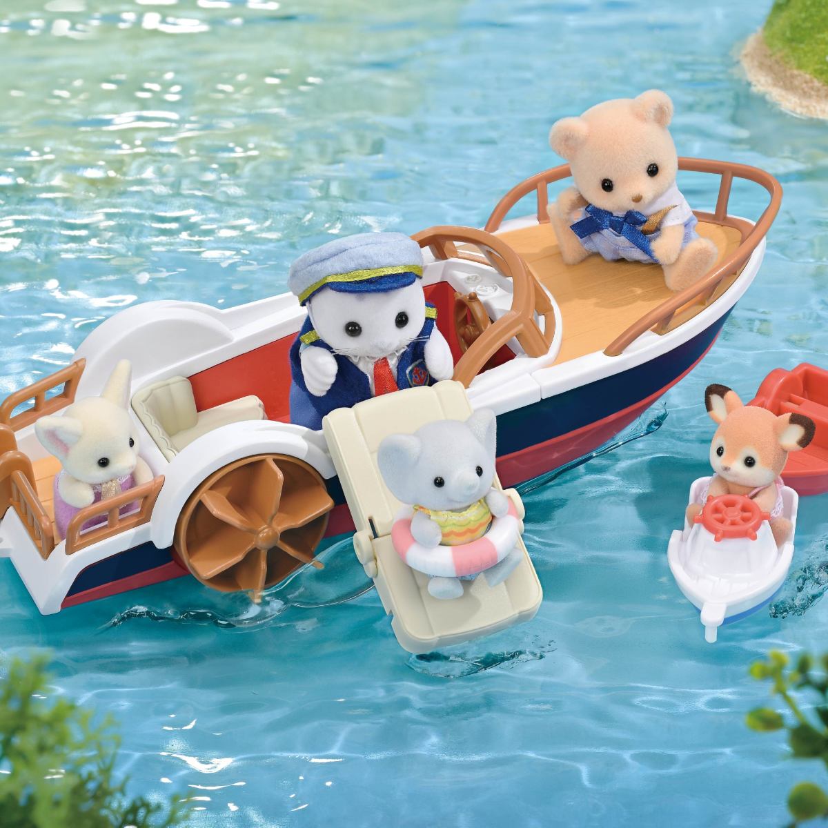 Calico Critters animal figures playing on a toy paddle boat and small watercraft in water