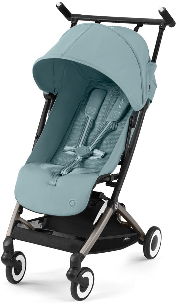Stormy blue compact stroller by Cybex with mesh seat, black frame, white-rimmed wheels, and extended canopy, front view