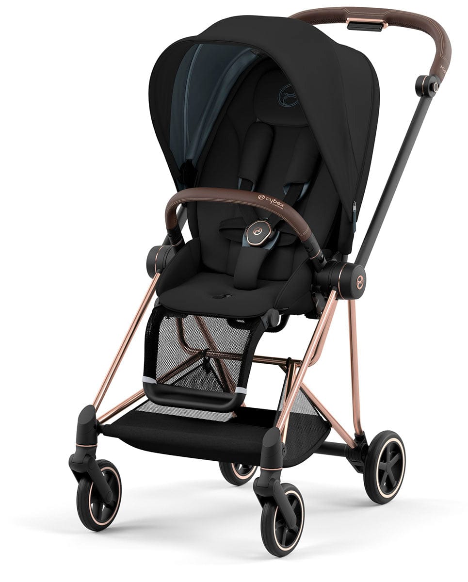 Rose gold and black Mios 3 stroller by Cybex, featuring brown leatherette accents, mesh footrest, and five-point harness, front three-quarter view
