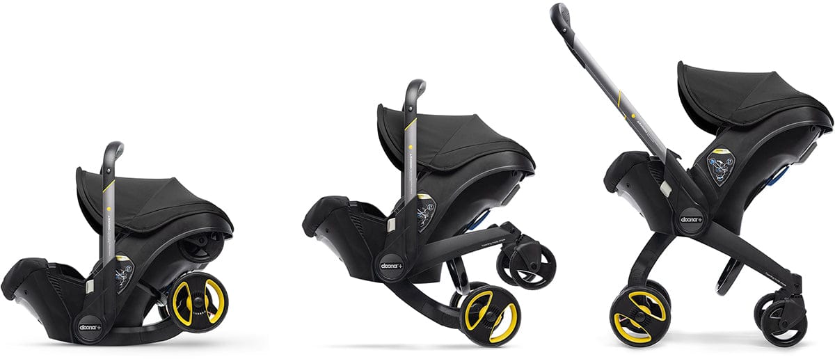 Doona+ Infant Car Seat & Stroller with Handlebar Cover Bundle - Nitro Black / Brown Leather - SP101-10-033-003-SP147-10-025-003
