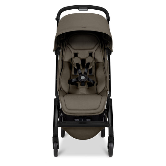 Hazel brown lightweight compact stroller by Joolz with black frame, five-point harness, and adjustable canopy, side view
