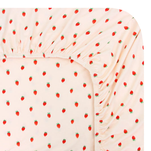 Lou Lou and Company changing pad cover with a pink background and small strawberry print