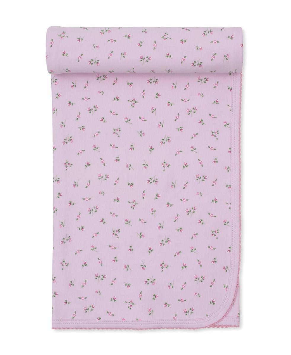 Kissy Kissy pink baby blanket with small floral print