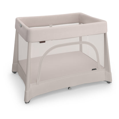 UPPAbaby Remi playard in beige with mesh sides and zippered side opening