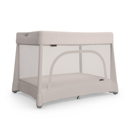 UPPAbaby Remi playard in light beige with mesh sides and zippered side opening