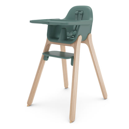 Sage green high chair with wooden legs and integrated tray
