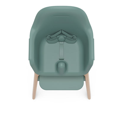 UPPAbaby sage green high chair with wooden legs and safety harness