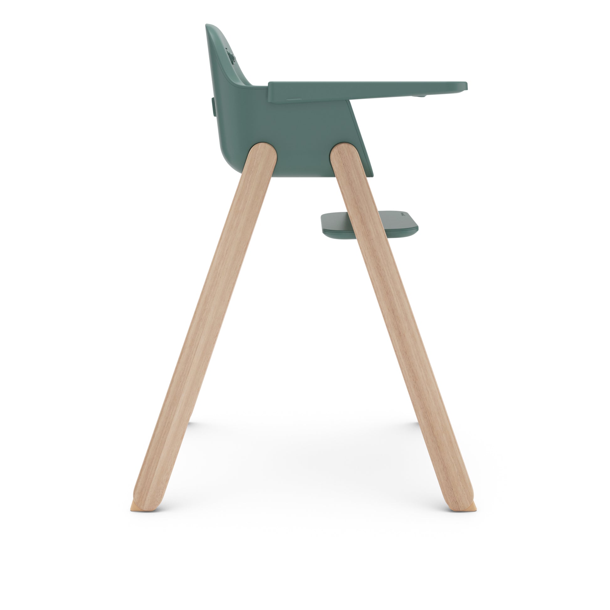 Side view of a green plastic high chair with light wood legs and a footrest