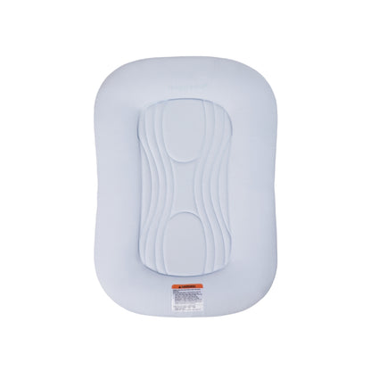 Light blue Snuggle Me infant lounger with central contoured cushion