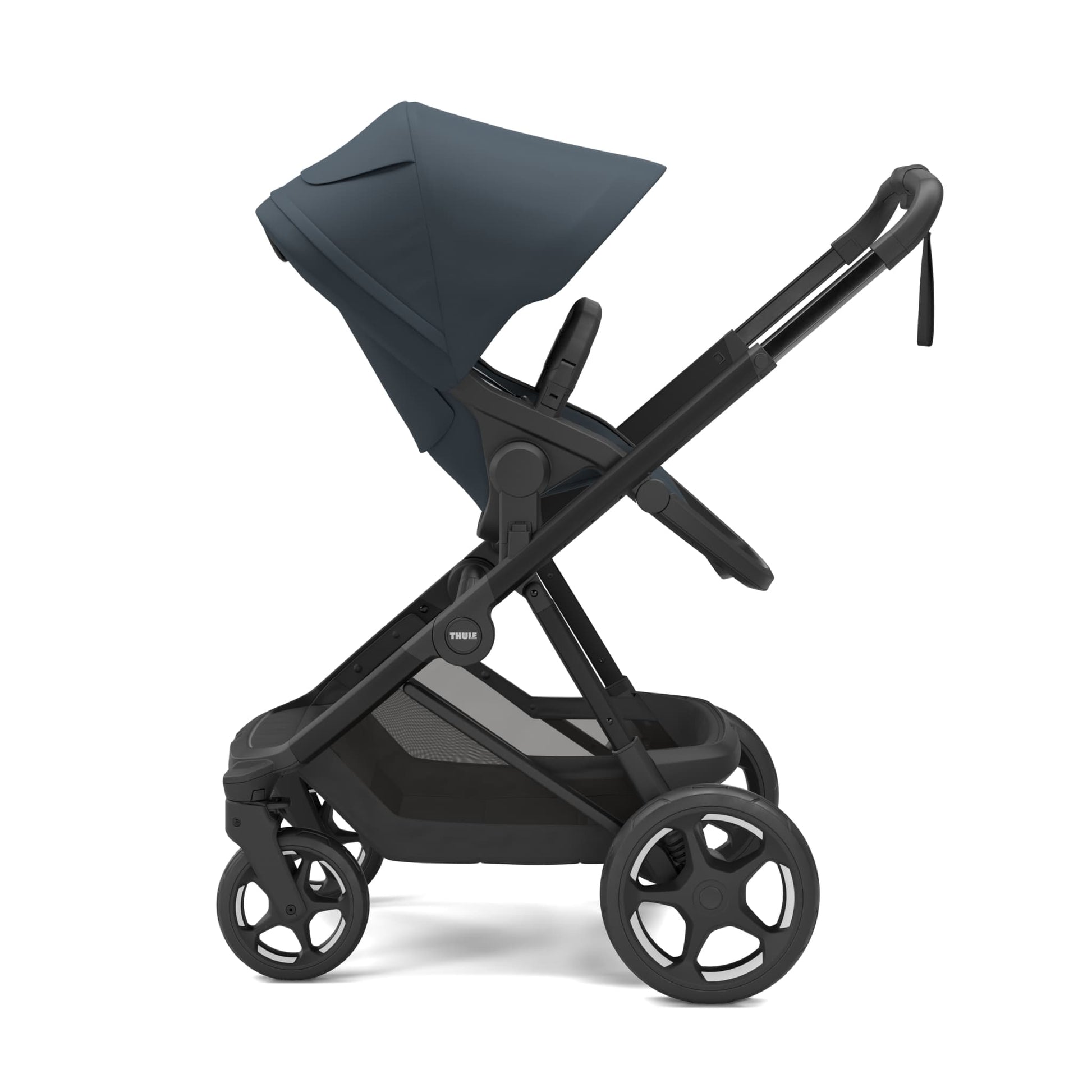 Thule stroller with dark blue canopy and black frame