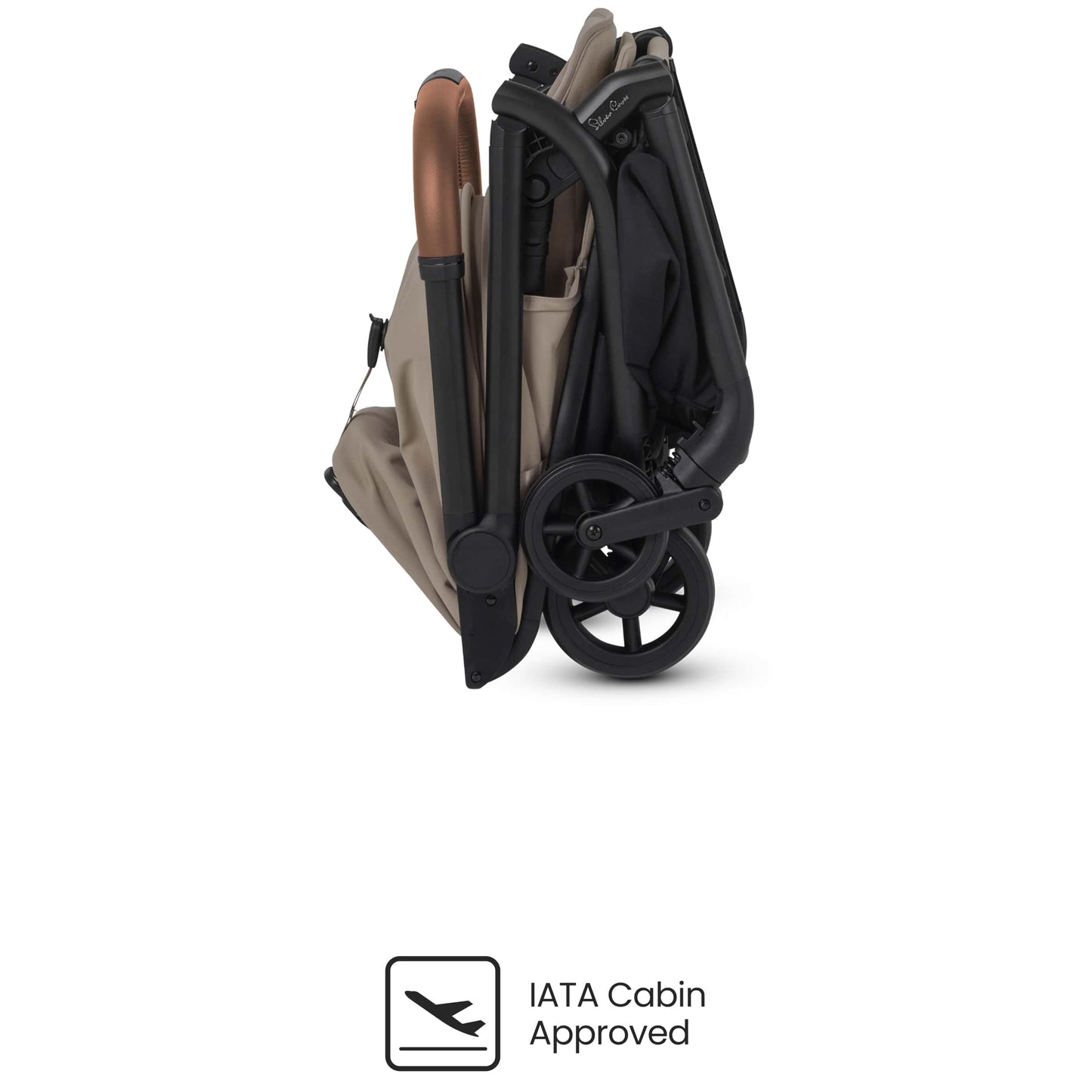 A folded stroller shown from the side on a clean white background, with an 'IATA Cabin Approved' badge below it. The stroller features a black frame and wheels, with beige fabric panels and a brown leatherette handle.