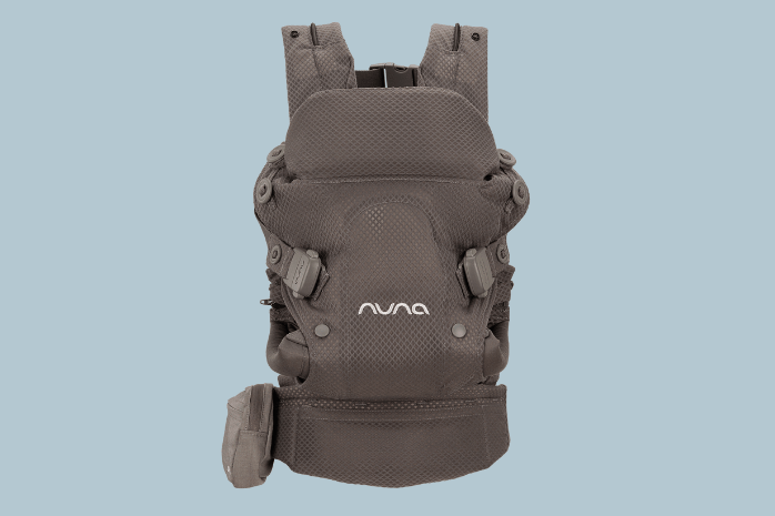 Nuna CUDL carrier with Nuna logo on a light blue background