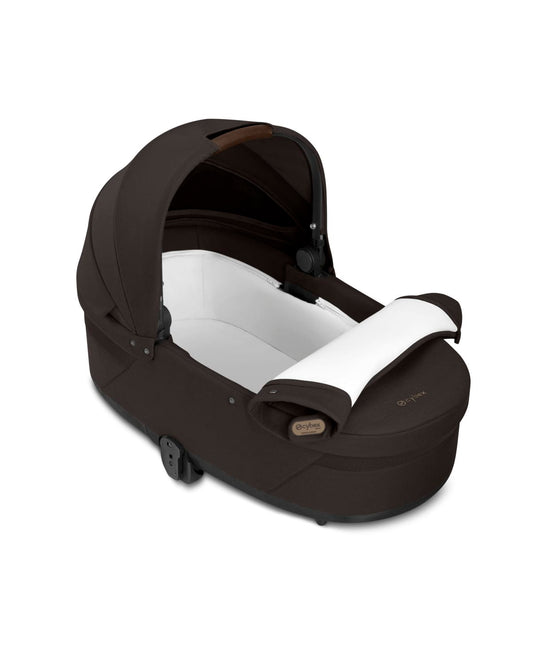 Cybex dark brown carrycot with canopy and leather handle
