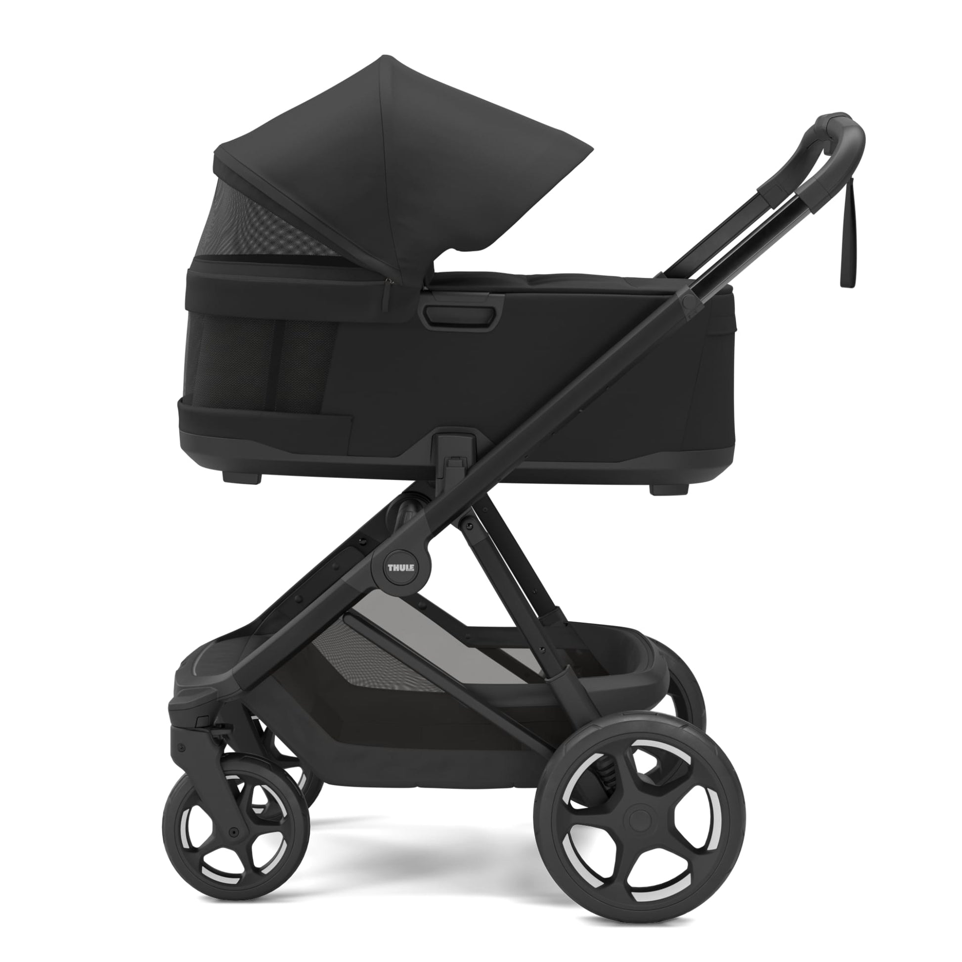 Thule black bassinet stroller in side profile view