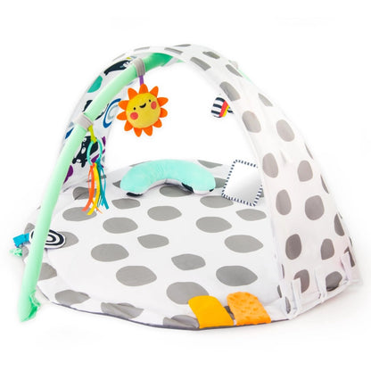 Sassy 3-in-1 Sensory Milestone Play Gym with crossed arches and toys