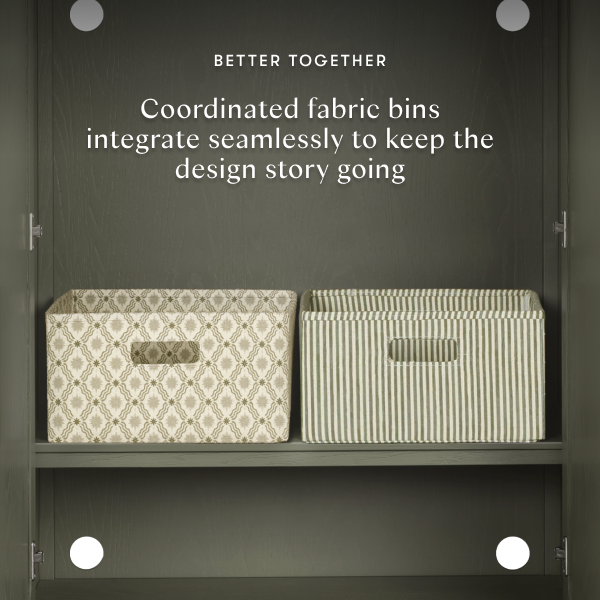 Babyletto fabric storage bins with patterned and striped designs on a shelf