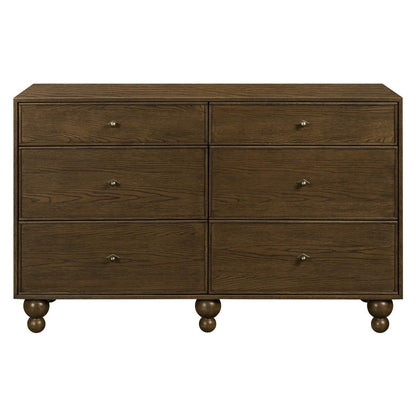 Babyletto six drawer wooden dresser with round feet
