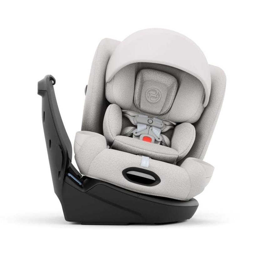 Cybex beige infant car seat with canopy and five point harness