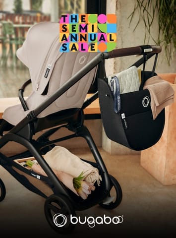 Bugaboo stroller with black storage bag and beige seat liner during semi annual sale