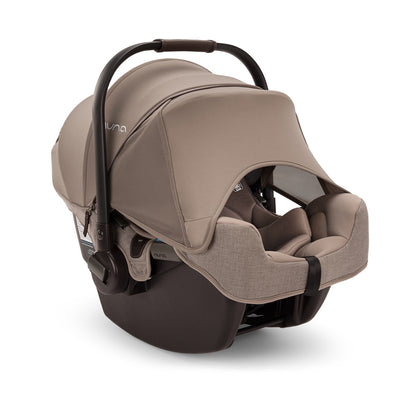 Nuna PIPA RX Infant Car Seat + RELX Base with Load Leg - Cedar