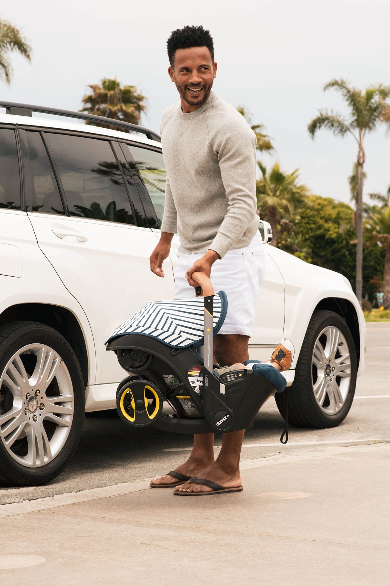 Doona Infant Car Seat & Stroller - Vacation (Limited Edition)