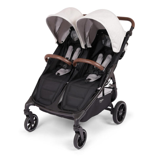 Valco Trend Duo double stroller with black seats and cream canopies