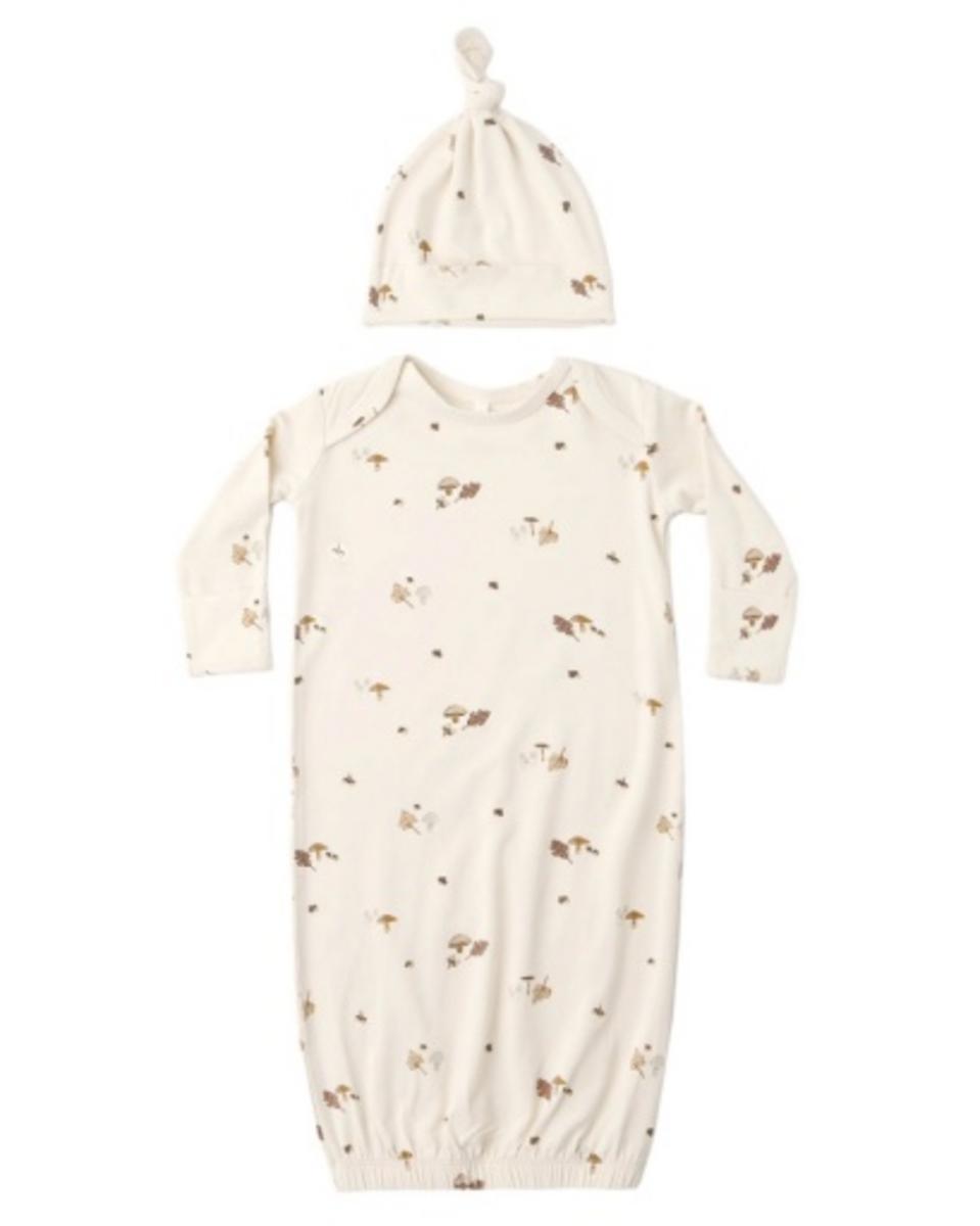 Cream colored baby gown and matching knotted hat with brown mushroom and leaf print