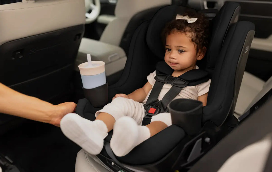 child sitting in britax galaxy360 car seat in black inside vehicle- britax sale at albee