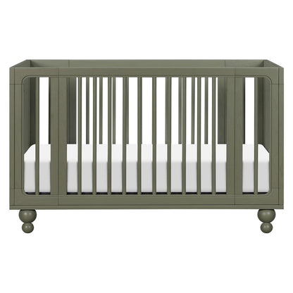Babyletto olive green wooden crib with vertical slats and round feet