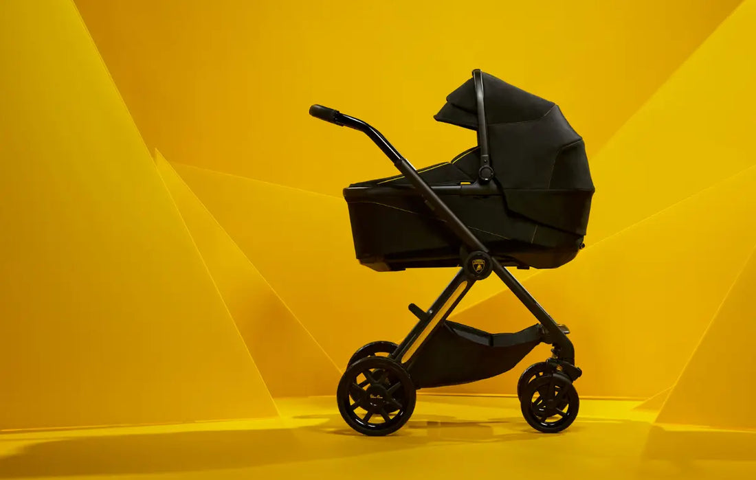 silver cross Reef AL Giallo with bassinet against a golden yellow background - new at albee.