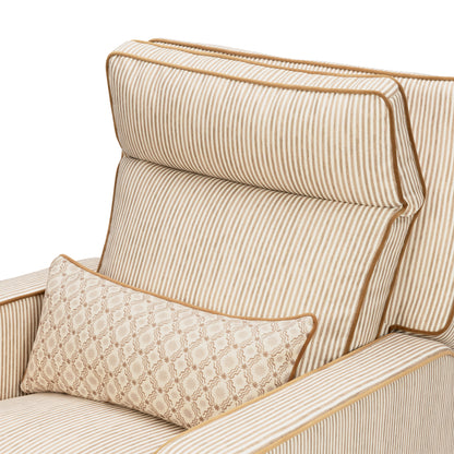 Babyletto striped armchair with a patterned lumbar pillow
