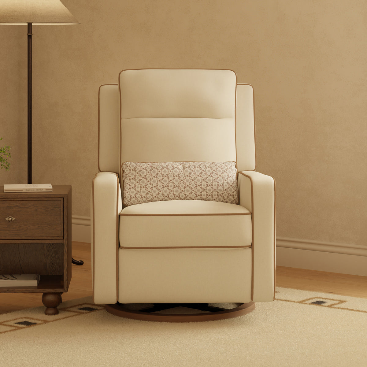 Babyletto cream swivel glider recliner with patterned lumbar pillow