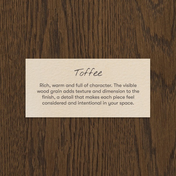 Babyletto toffee wood finish swatch with visible grain texture