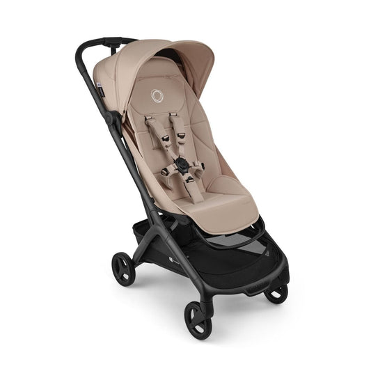 Bugaboo beige stroller with black frame and five point harness