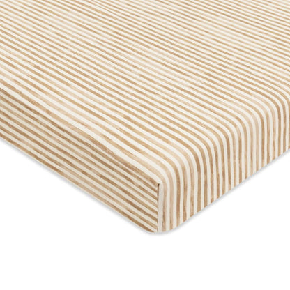 Babyletto crib sheet with tan and white vertical stripes