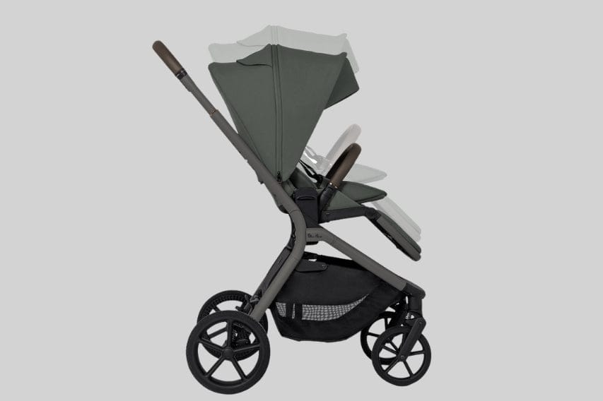 A green stroller with a brown handle is showcased against a gray background, highlighting its convertible seating positions.