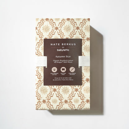 Babyletto Nate Berkus Autumn Star organic brushed cotton midi crib sheet in packaging