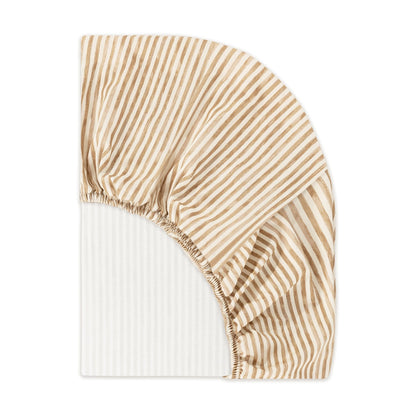 Babyletto fitted crib sheet with tan and white vertical stripes