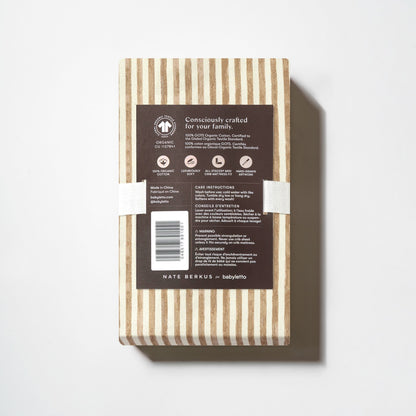 Babyletto Nate Berkus crib sheet packaging with product information and GOTS organic certification details