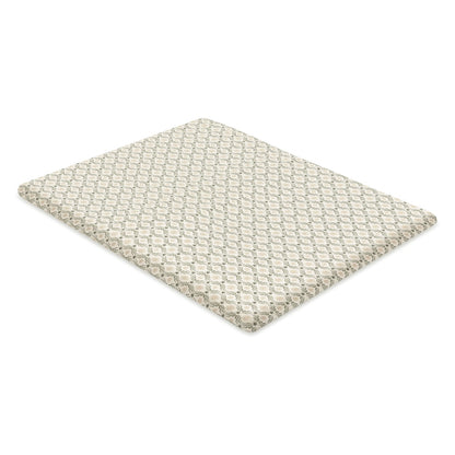 Babyletto crib mattress pad with a repeating geometric wave and star pattern