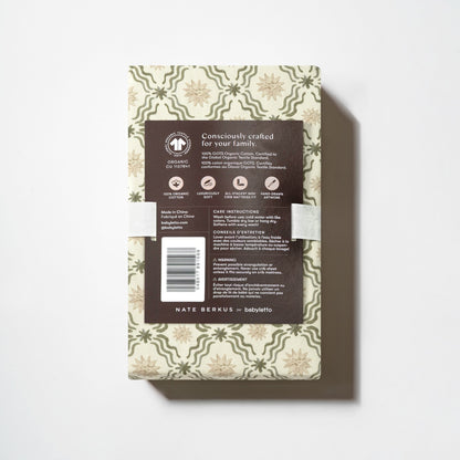 Babyletto crib sheet packaging with Nate Berkus collaboration branding and product information