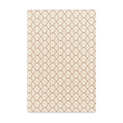 Babyletto crib sheet with a cream and brown geometric diamond pattern featuring small star accents