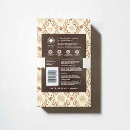 Babyletto Nate Berkus crib sheet packaging with product information and care instructions