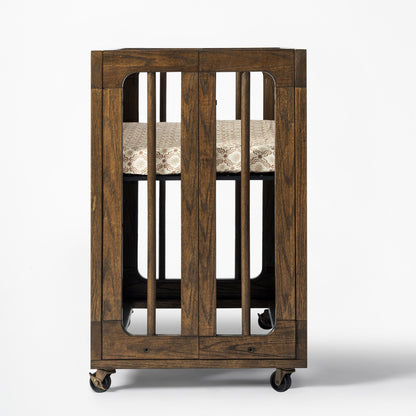 Babyletto wooden bassinet with slatted sides and wheels