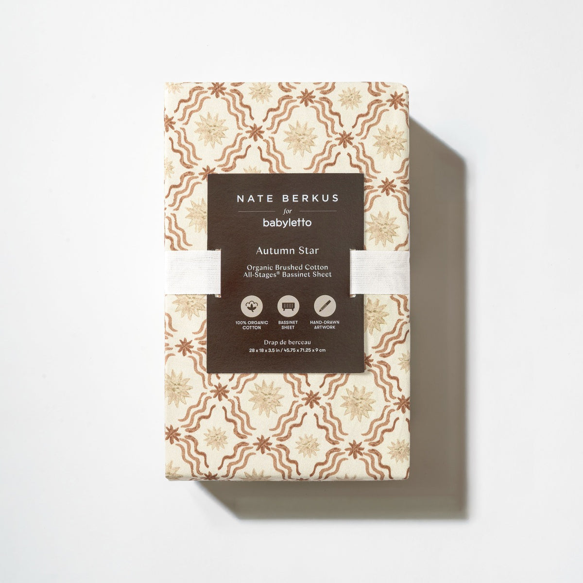 Babyletto Nate Berkus organic cotton bassinet sheet in Autumn Star pattern