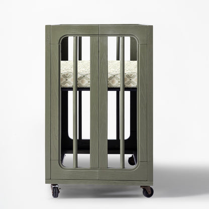 Babyletto olive green wooden bassinet with patterned mattress and wheels