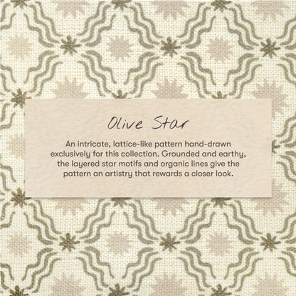 Babyletto Olive Star fabric pattern featuring olive green stars and wavy lines on a cream background