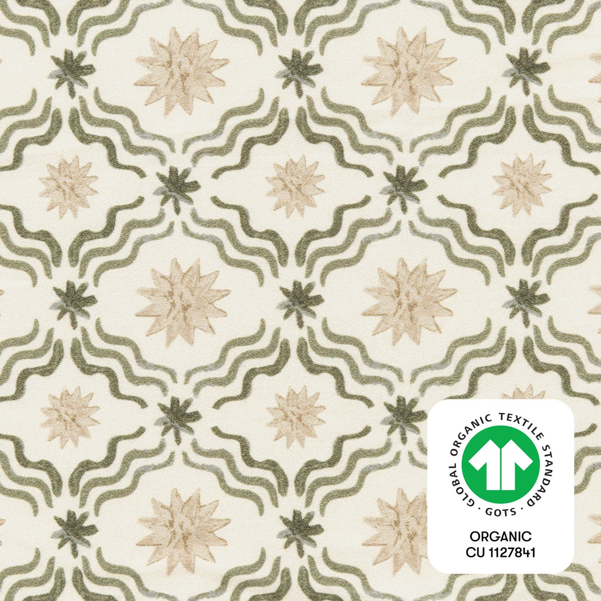 Babyletto fabric with green wavy lines and beige star patterns featuring a GOTS organic certification label